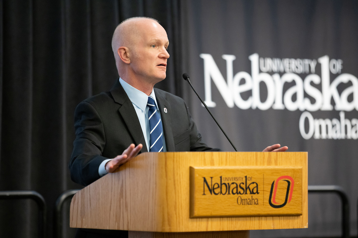 Rich Klein, Ph.D. at the podium