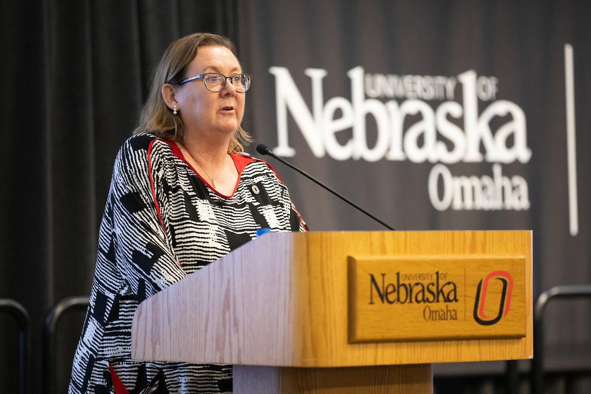 Deborah Smith-Howell, Ph.D, at the podium