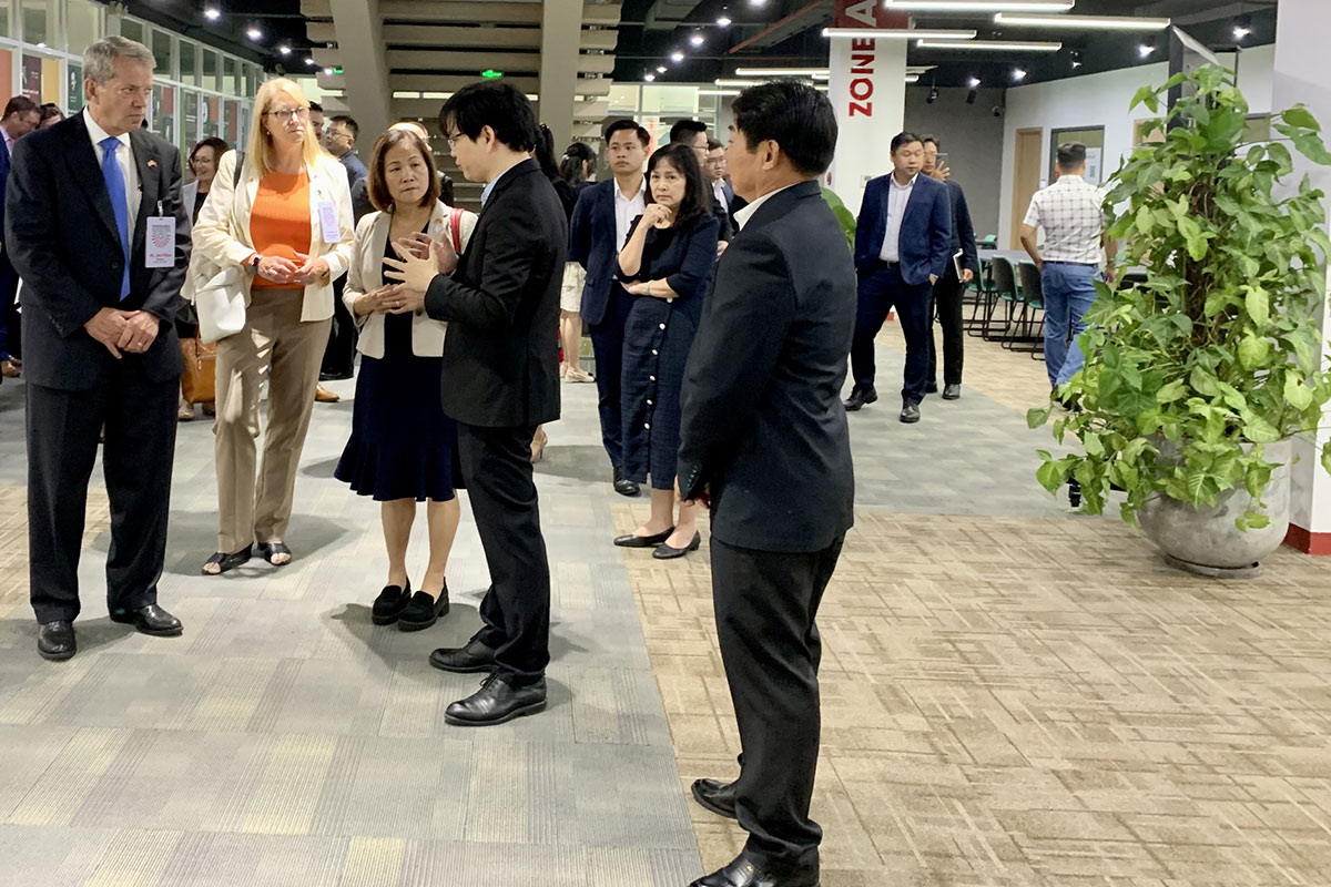 Chancellor Li and Nebraska Governor Pillen converse with Dr. Ngo Minh Duc, President of Eastern International University (EIU) prior to the Memorandum of Understanding (MOU) signing in Binh Duong Province, Vietnam.