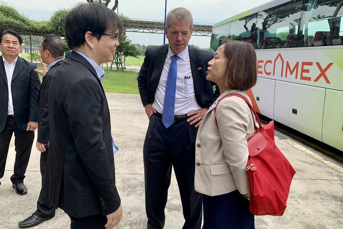 Chancellor Li and Nebraska Governor Pillen converse with Dr. Ngo Minh Duc, President of Eastern International University (EIU) prior to the Memorandum of Understanding (MOU) signing in Binh Duong Province, Vietnam.