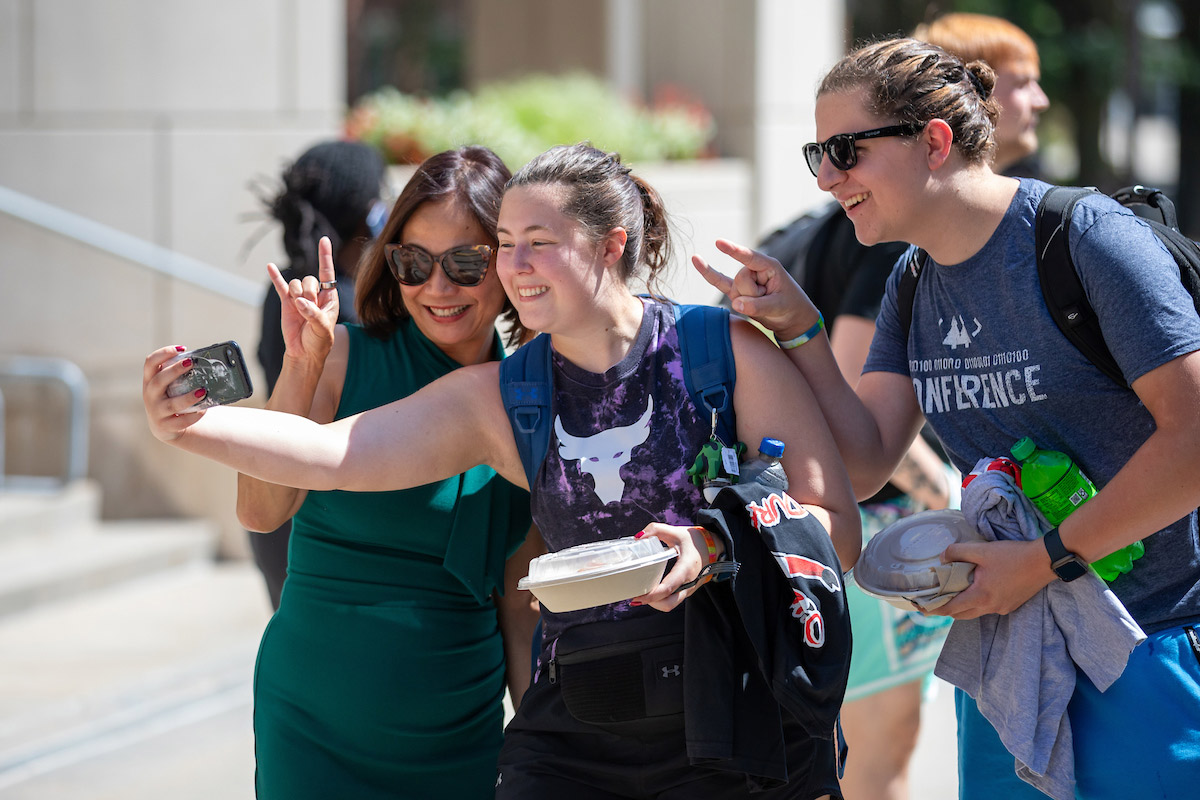 Chancellor Li takes a photo with students during Durango Days.