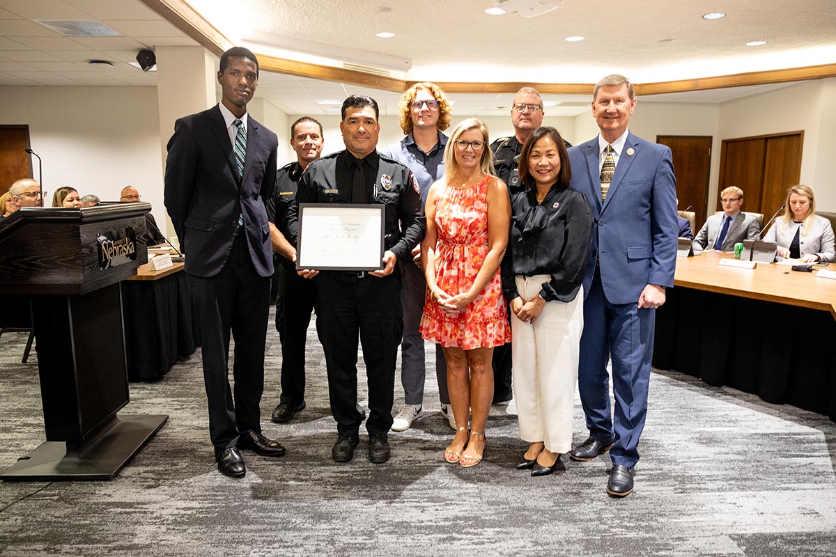 Joseph Sanchez receives the Board of Regents KUDOS award.