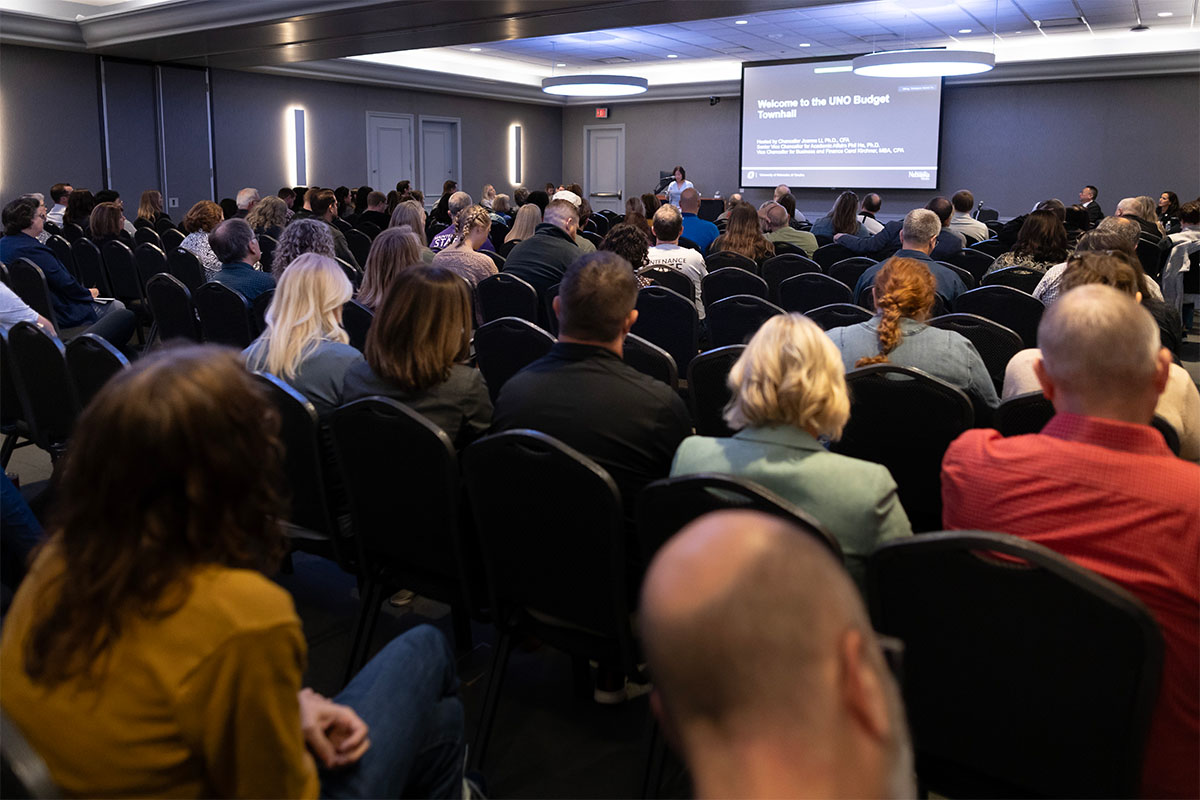 A packed Bootstrapper Hall listens in, along with virtual attendees, at the budget town hall held on Friday, Oct. 20 at UNO's Thompson Alumni Center.