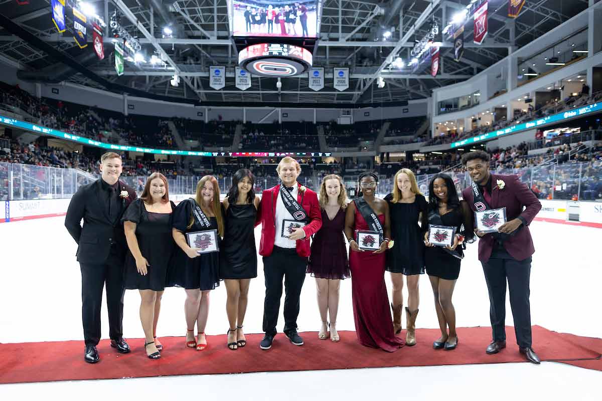 The top ten homecoming royalty candidates stand together. 