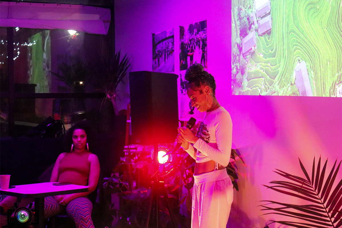 Kaija Jeanaé performing at a Pull Up and Vibe Open Mic night at the Fabric Lab in North Omaha in early 2023.
