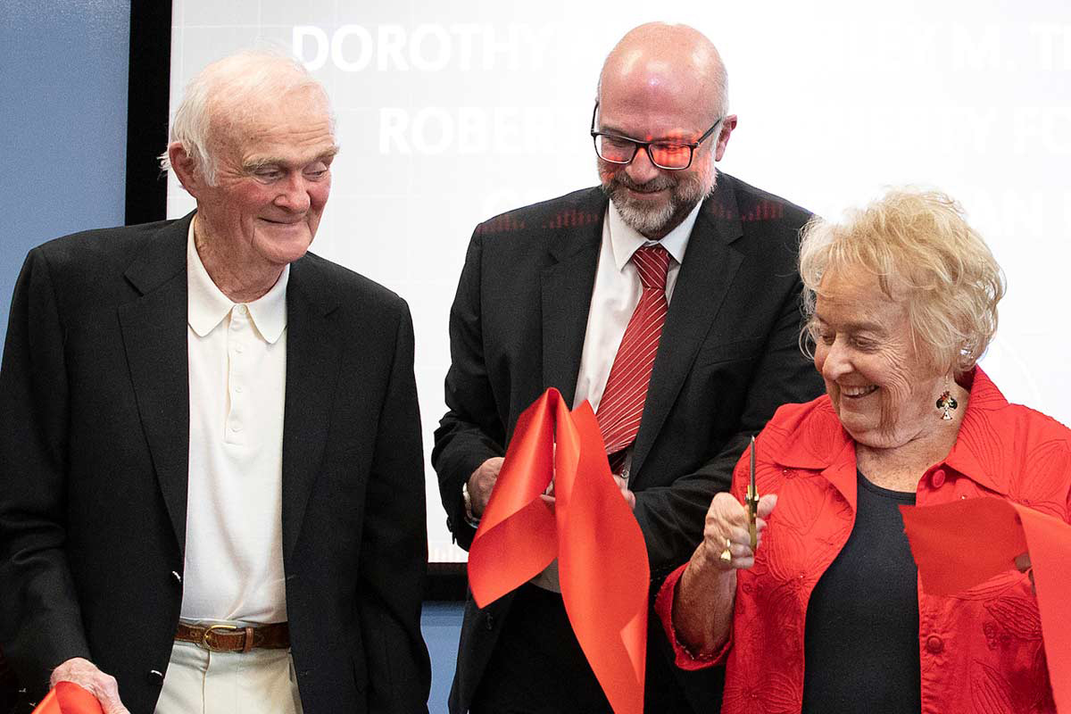 Bill Scott, Nikolaos Stergiou, Ph.D., and Ruth Scott celebrate the ribbon cutting for the Biomechanics Research Building expansion (2019).