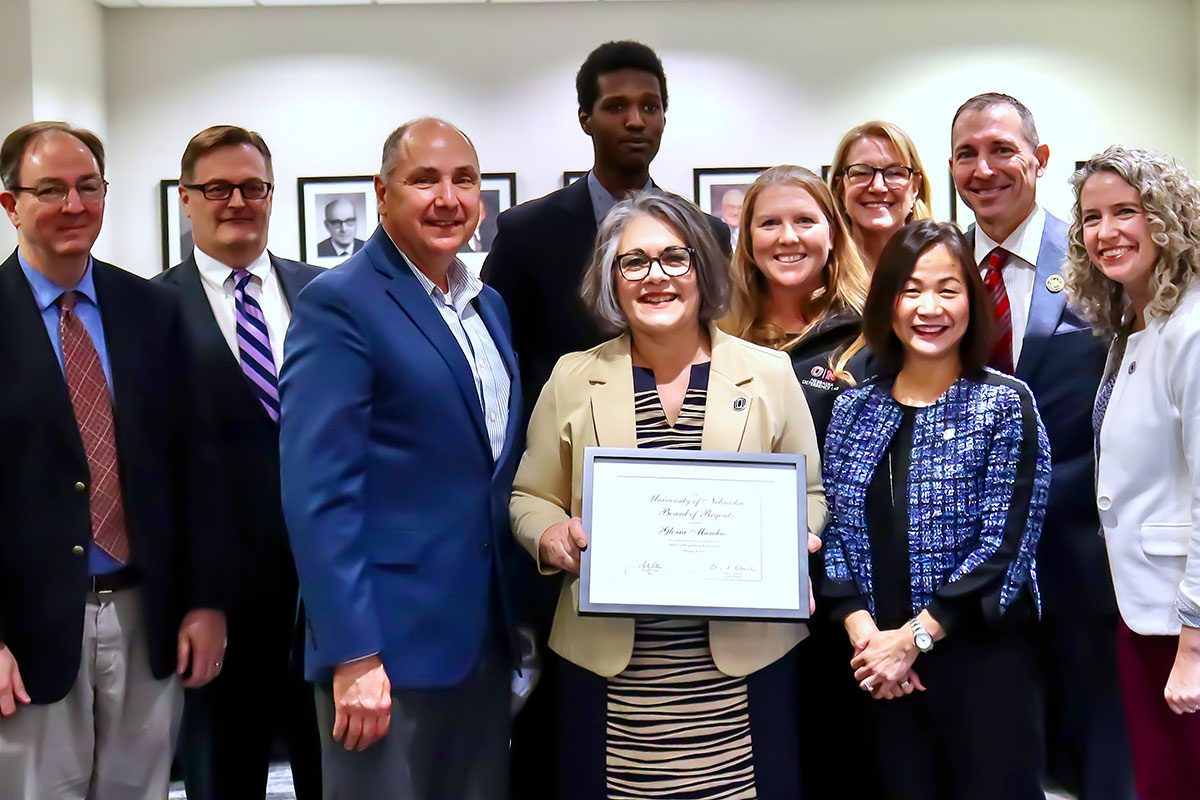 Pictured: Political Science Department Chair Carson Holloway, Ph.D.; Senior Associate Dean of the College of Arts and Sciences Randy Adkins, Ph.D.; Rob Marchio, husband; Gloria Marchio; Student Body President/Regent Hakim Lotoro; Associate Professor Political Science Michelle Black, Ph.D.; Interim Associate Vice Chancellor for Global Engagement International Jody Neathery-Castro, Ph.D; UNO Chancellor Joanne Li, Ph.D., CFA; NU System Interim President Chris Kabourek; and Dean of the College of Arts and Sciences Melanie Bloom.