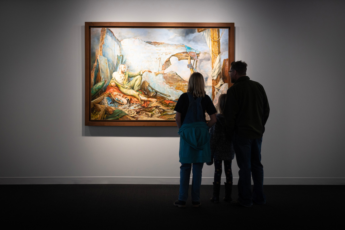 A family touring the Samuel Bak Museum: The Learning Center.