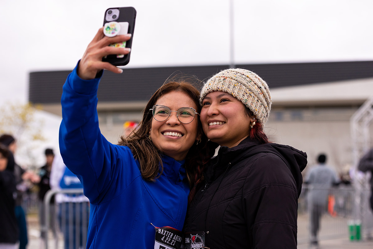 Friends snapping a selfie during the Claussen-Leahy Maverick Run.