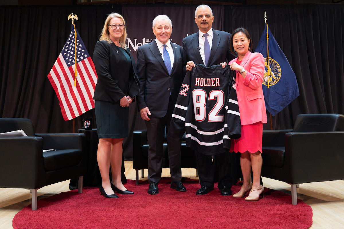 Near the conclusion of the forum, Holder Jr., was presented with a custom Omaha Hockey jersey by UNO Chancellor Joanne Li, Ph.D., CFA.