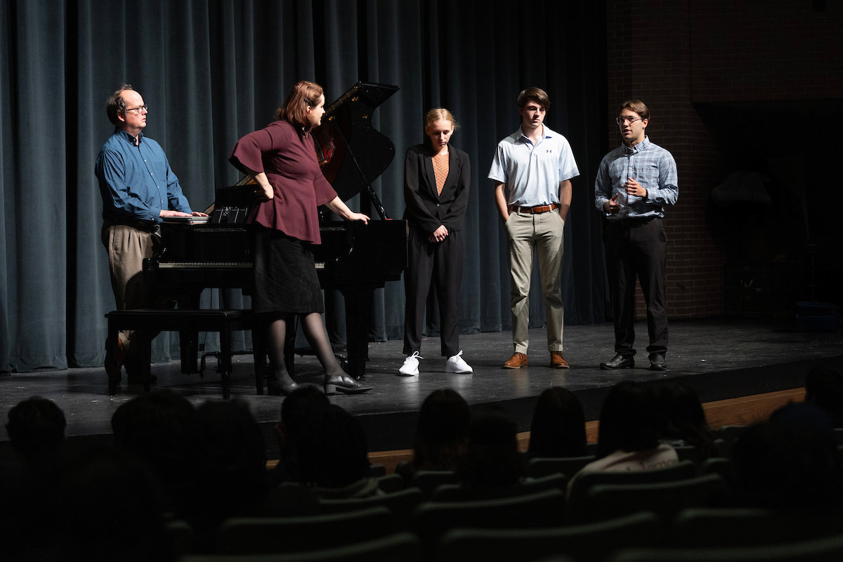 The University of Nebraska at Omaha’s Applied Piano students play the piano for high school students at Omaha South High School.