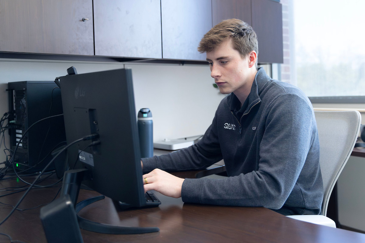 UNO graduate student Kolby Brink works in his office at the Biomechanics Building.