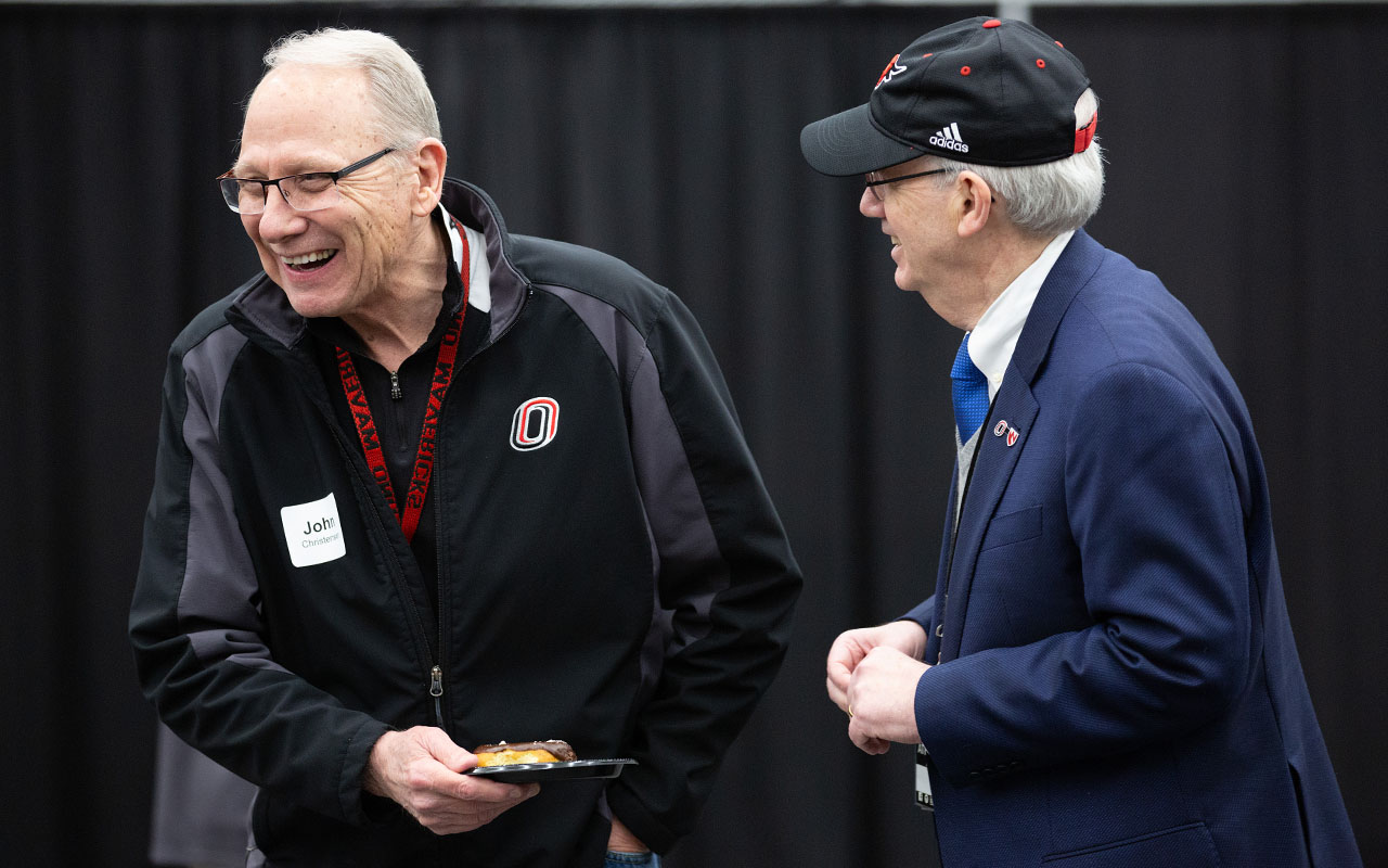 Christensen, left, and current University of Nebraska (NU) System President Jeffrey P. Gold, M.D., at the President's Pregame event with the NU Foundation prior to an Omaha Hockey game.