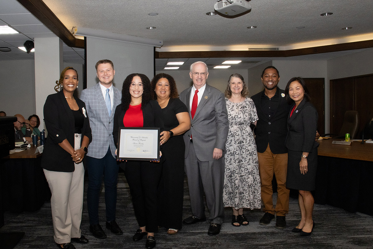 Pictured: Tarika Burton, executive director of the Office of Student Leadership and Involvement (SLI); UNO student body president/regent Drew Leisy; Sierra Roseby, recipient; Rayna Roseby, family member; NU System President Jeffrey P. Gold, M.D.; Cornelius Levering, Outreach Coordinator for SLI; Ja-Waun Moore, family member; UNO Chancellor Joanne Li, Ph.D., CFA.