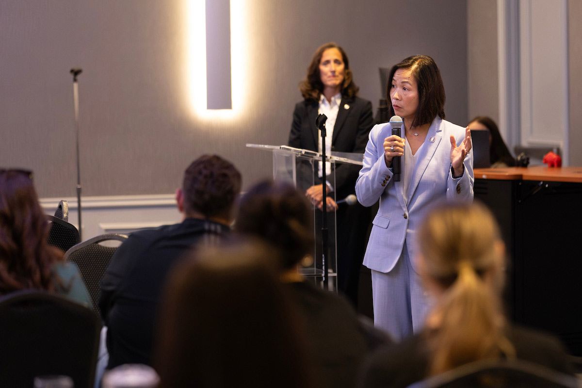 Chancellor Joanne Li speaks at the forum. 
