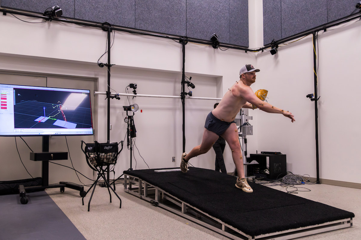 A pitcher's motion is studied in the Biomechanics Research Building.