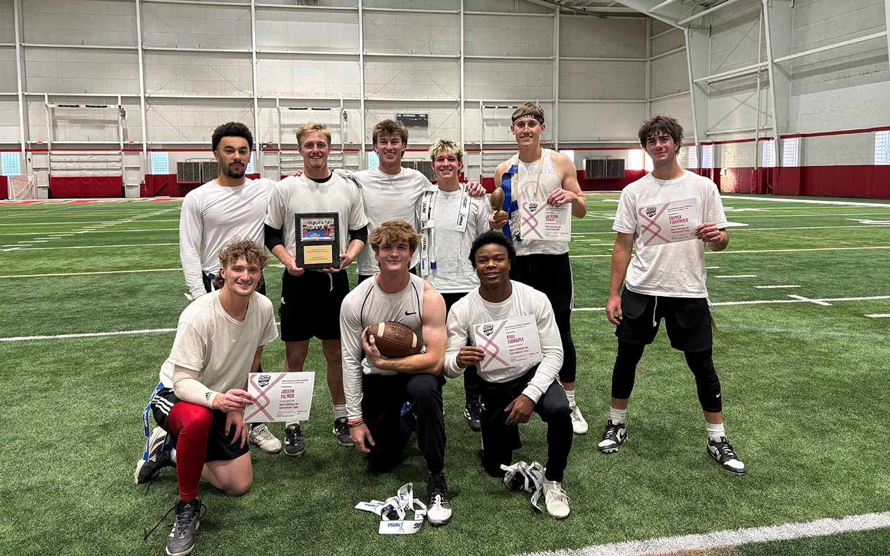 The “Dirtier Dozen” flag football team gathers for a photo after clinching their third straight NIRSA regional championship. 