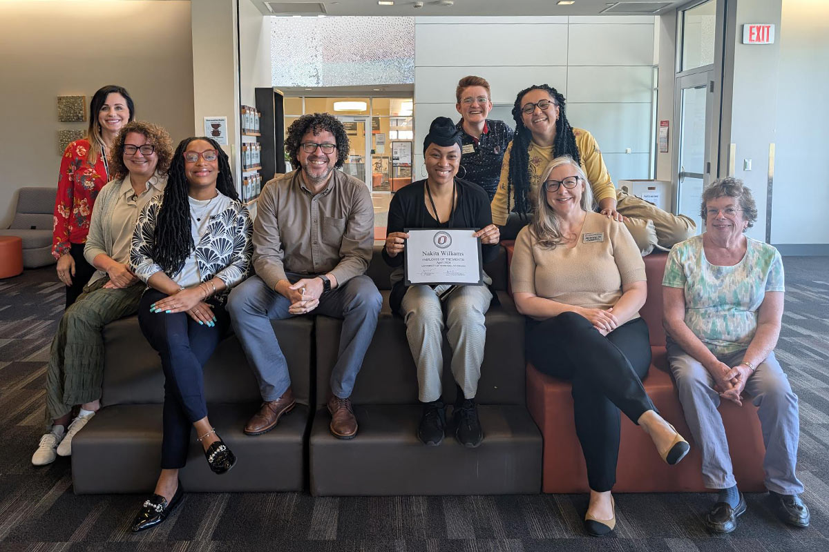 Nakita Williams with her colleagues
