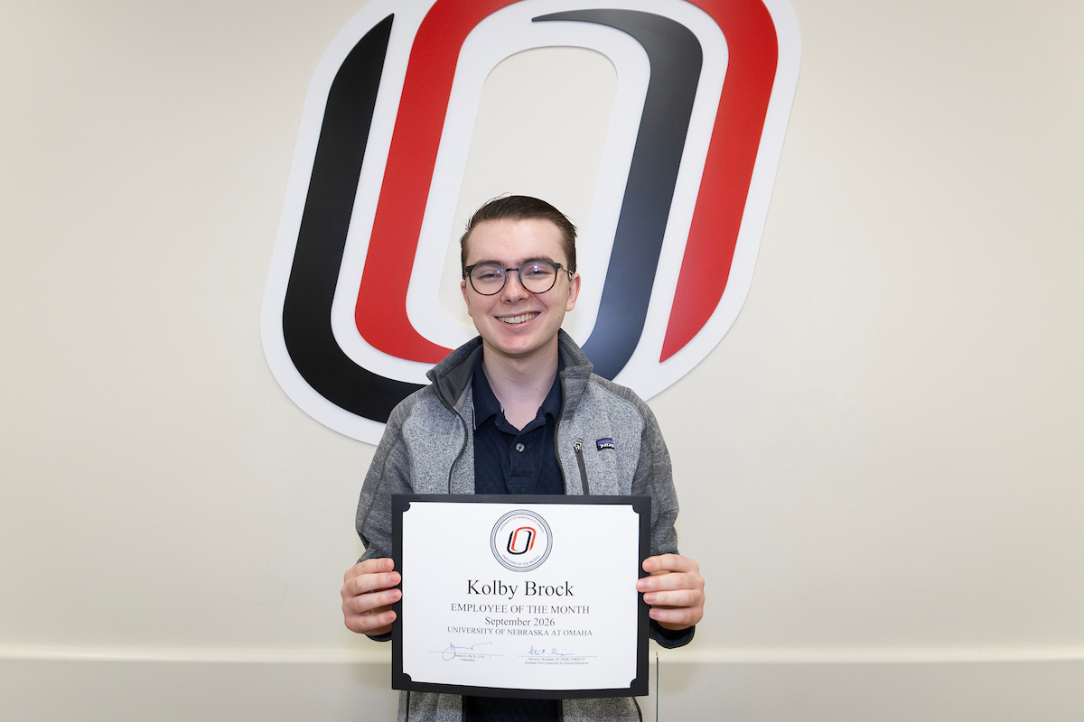 Kolby Brock holds his certificate.