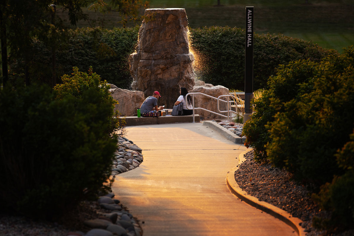 The Milo Bail Plaza Fountain glimmers in the sunrise.