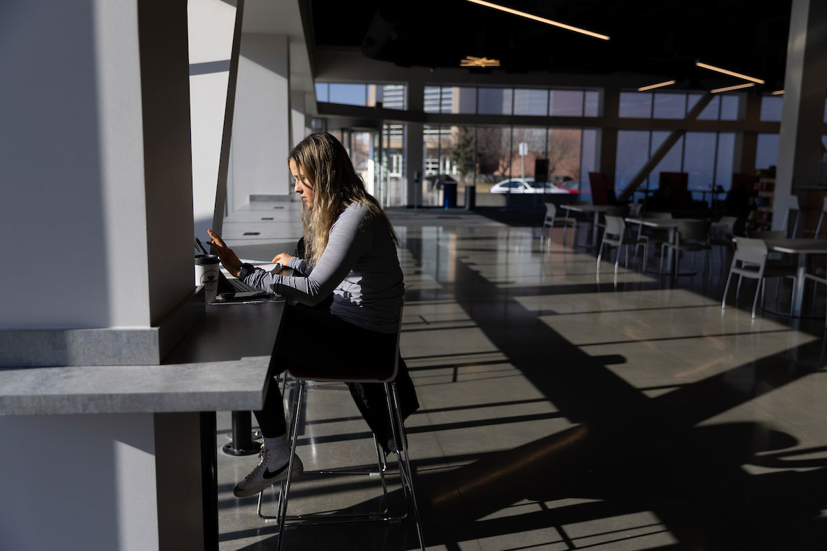 A student studies at the Maverick Landing on UNO's Scott Campus