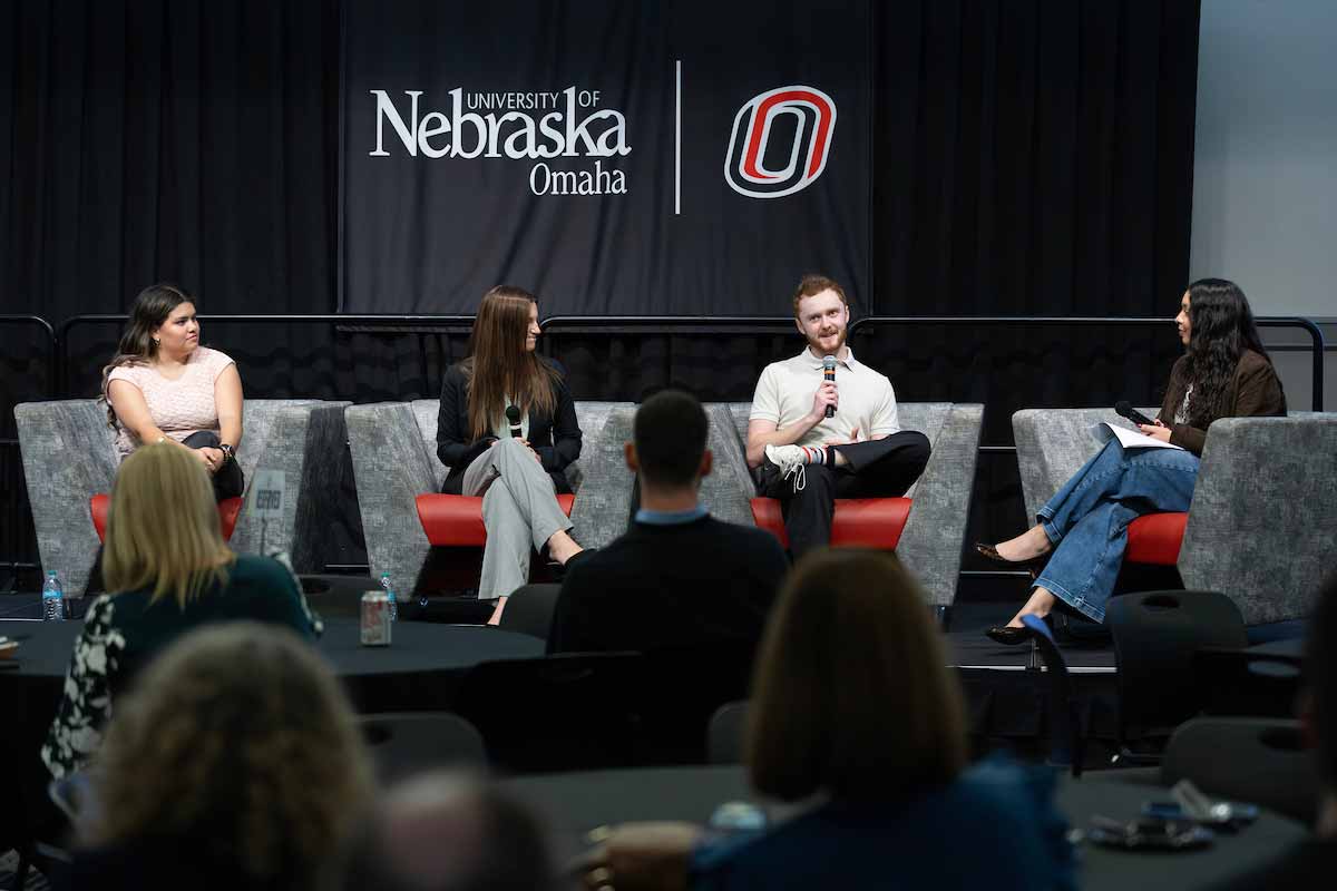 Students participate in a panel discussion