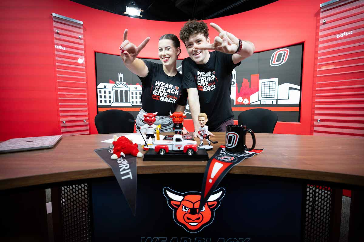 students celebrate the start of the 2026 wear black give back campaign at the UNO TV studio