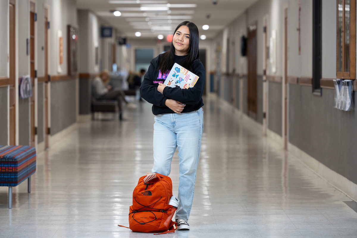 UNO December graduate, Brenda Sanchez, prepares for her last classes in the Arts and Sciences building. 