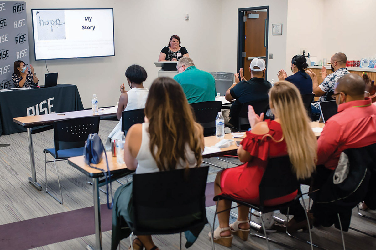 Participants in the RISE Business Academy pitch their developed business ideas to a panel of judges comprised of local business owners in the community. Image courtesy of RISE. Photo by McKenzie Ring.