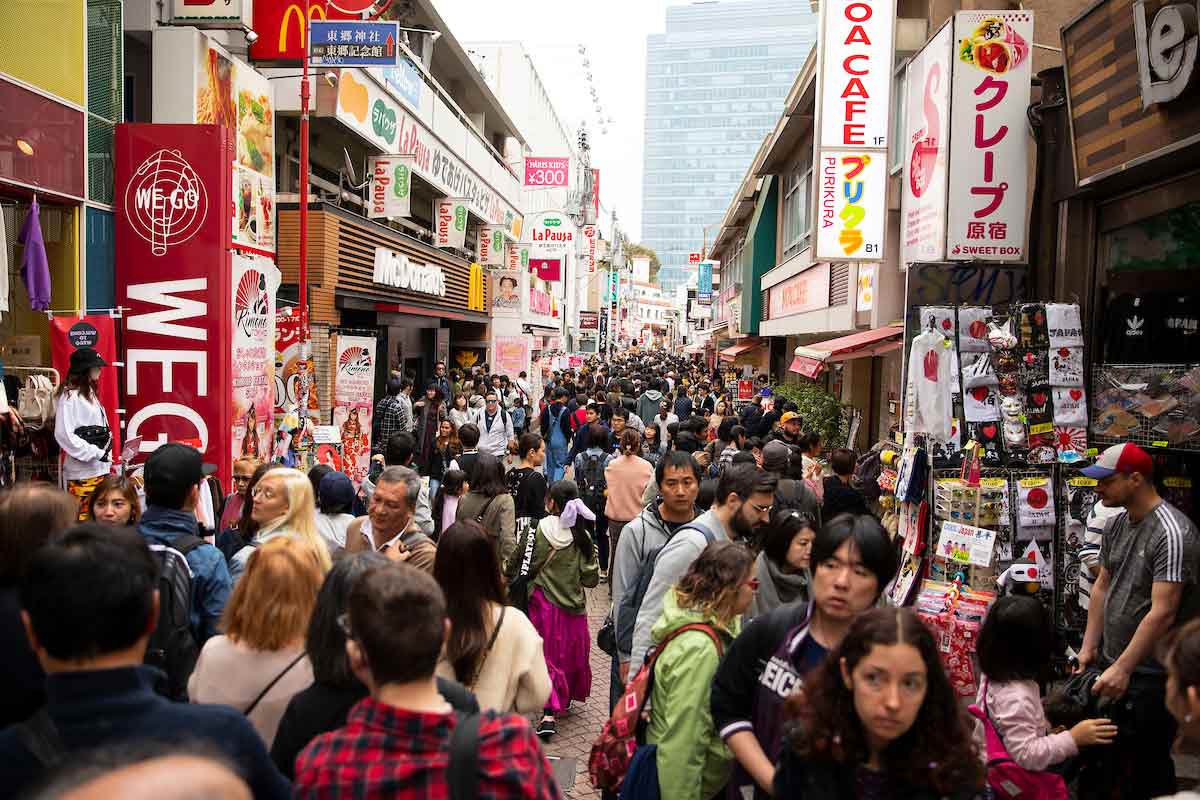 People pack the streets in the Harajuku neighborhood of Tokyo, Japan