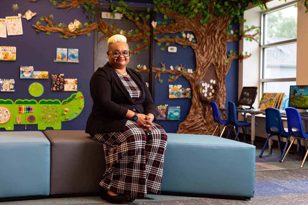 UNO alumna Shannon Putney at the Carter Lake Public Library.