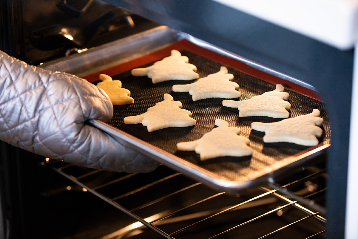 Maverick shaped cookies in the oven