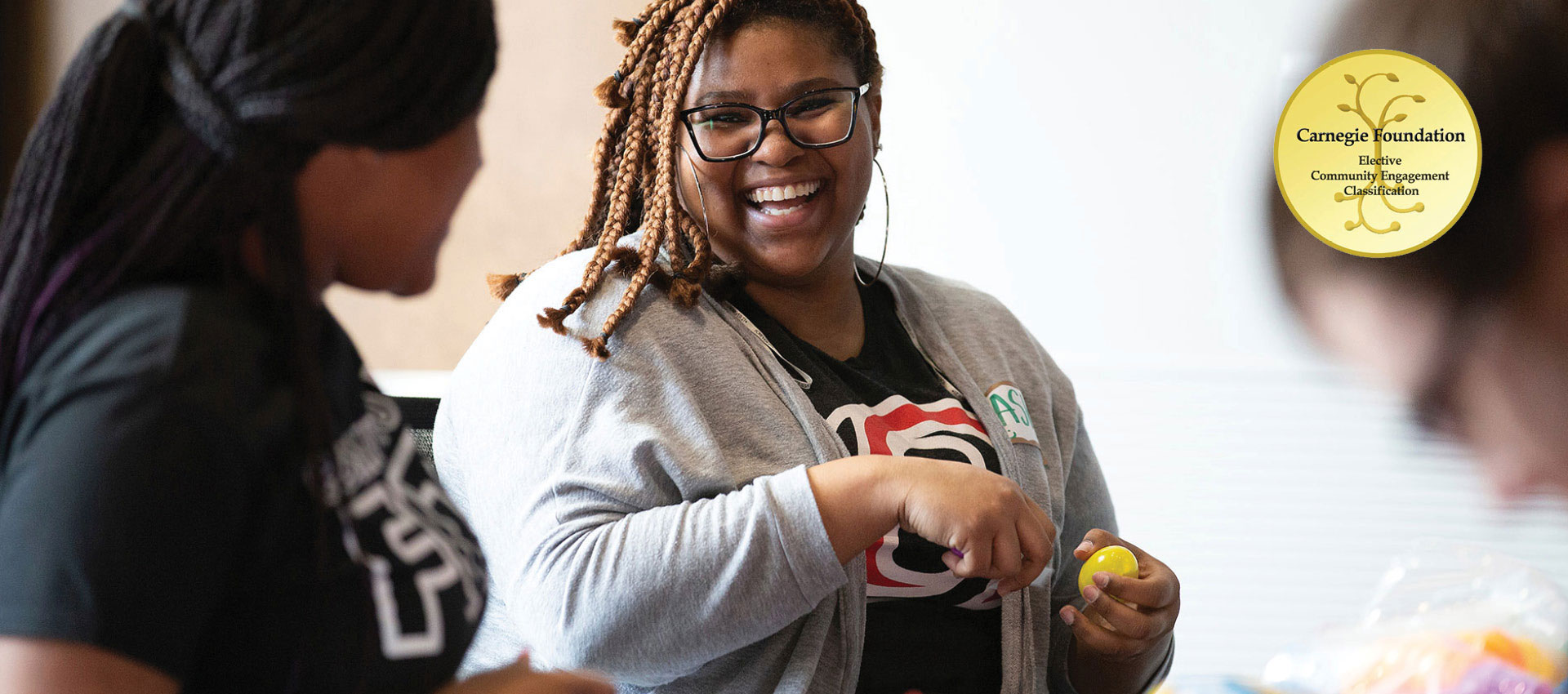 Volunteers assemble eggs for the Black Police Officers Association's annual Easter Egg Hunt as part of Seven Days of Service in the Community Engagement Center at the University of Nebraska at Omaha in Omaha.