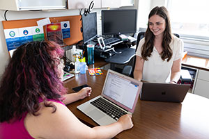 The Wellbeing Partners, a local nonprofit, working in their CEC office space.