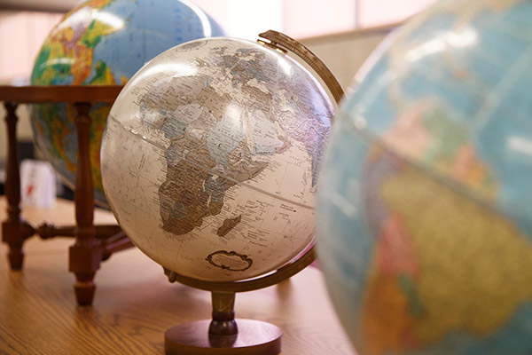 several globes on a countertop