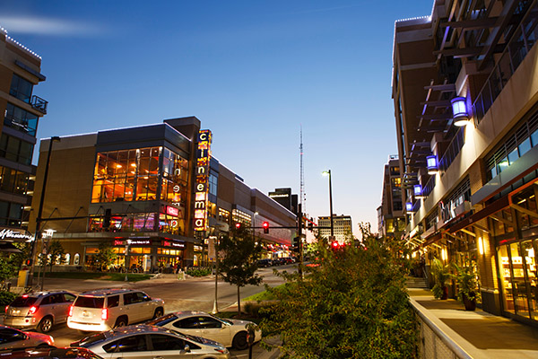 Omaha city street at dusk with downtown buildings
