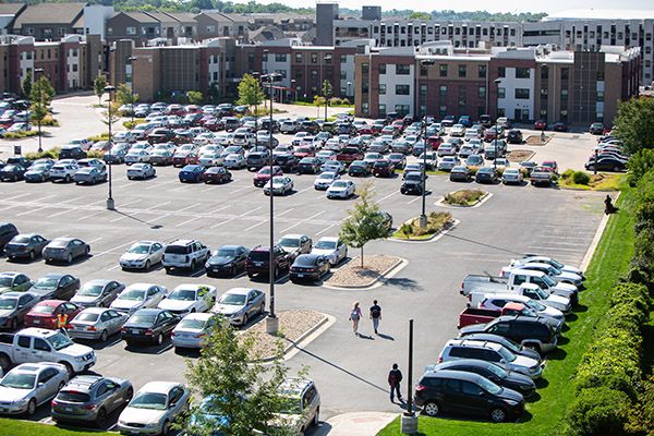 wide view of UNO parking lot filled with cars