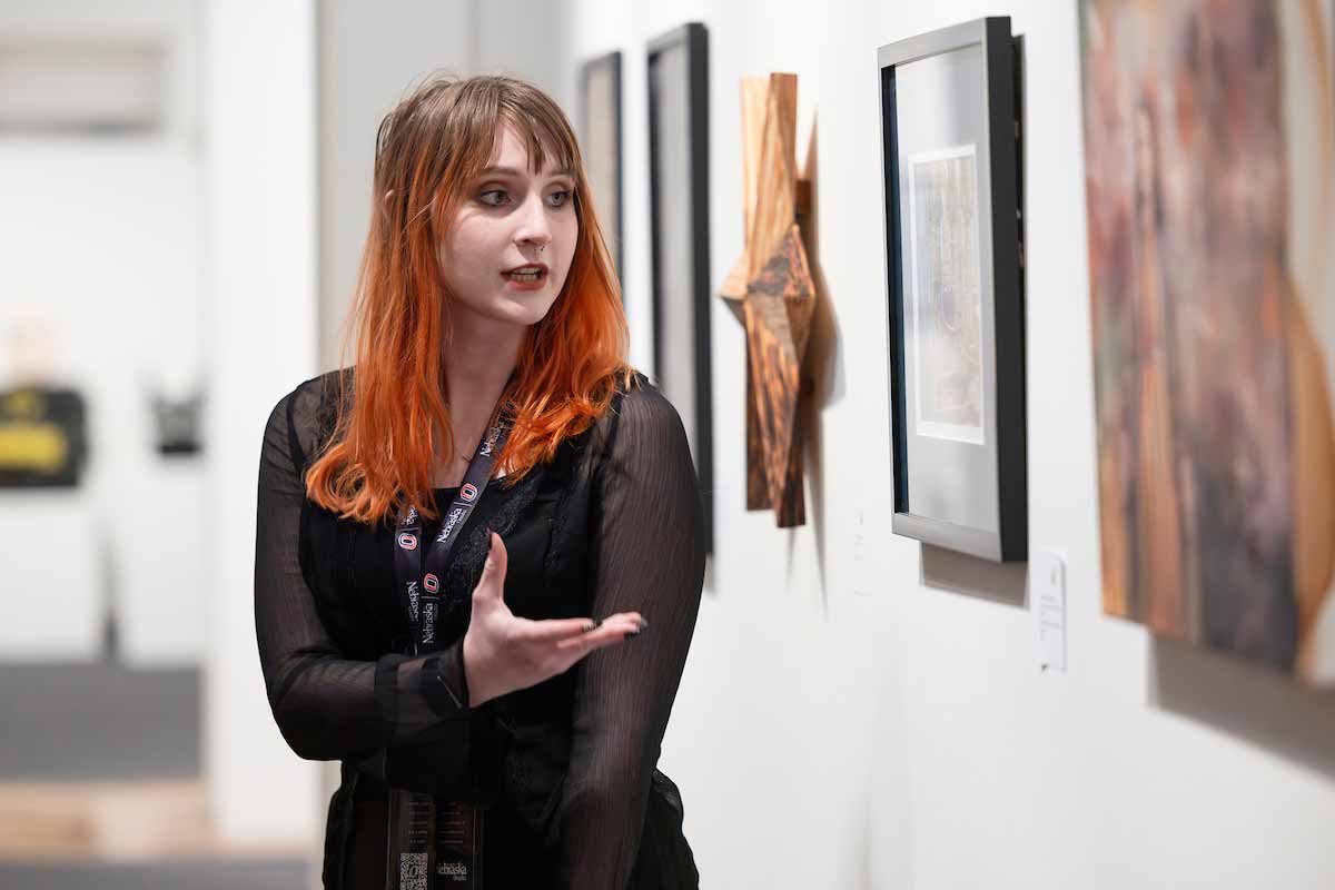 A student presents at the fair.