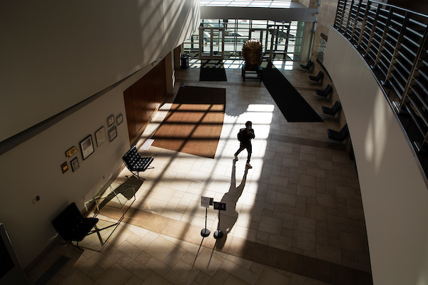 student walking through hallway