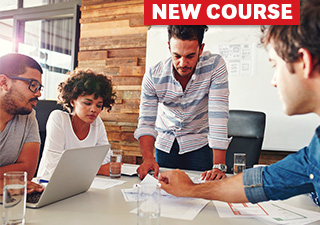 Group of co-workers brainstorming at conference table