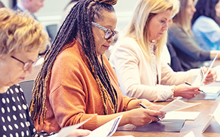 graduate students in a classroom