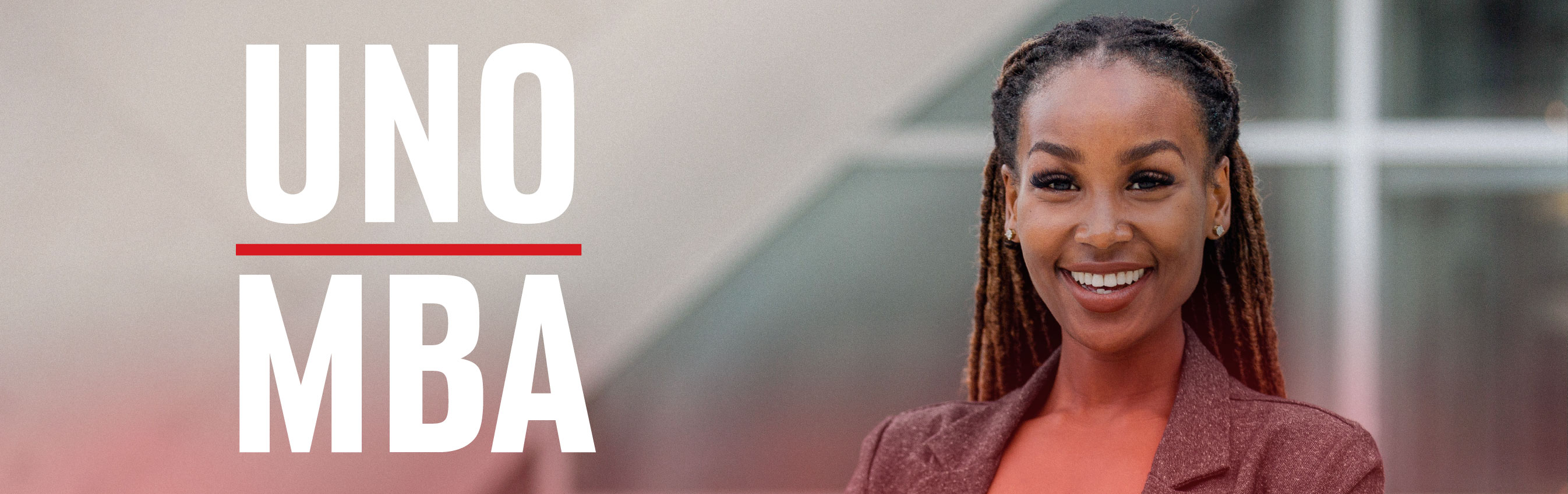Portrait of a confident woman smiling, wearing a blazer. Text reads "UNO MBA" in bold white and red.