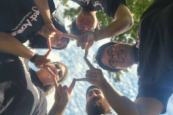 Five people looking at the camera.