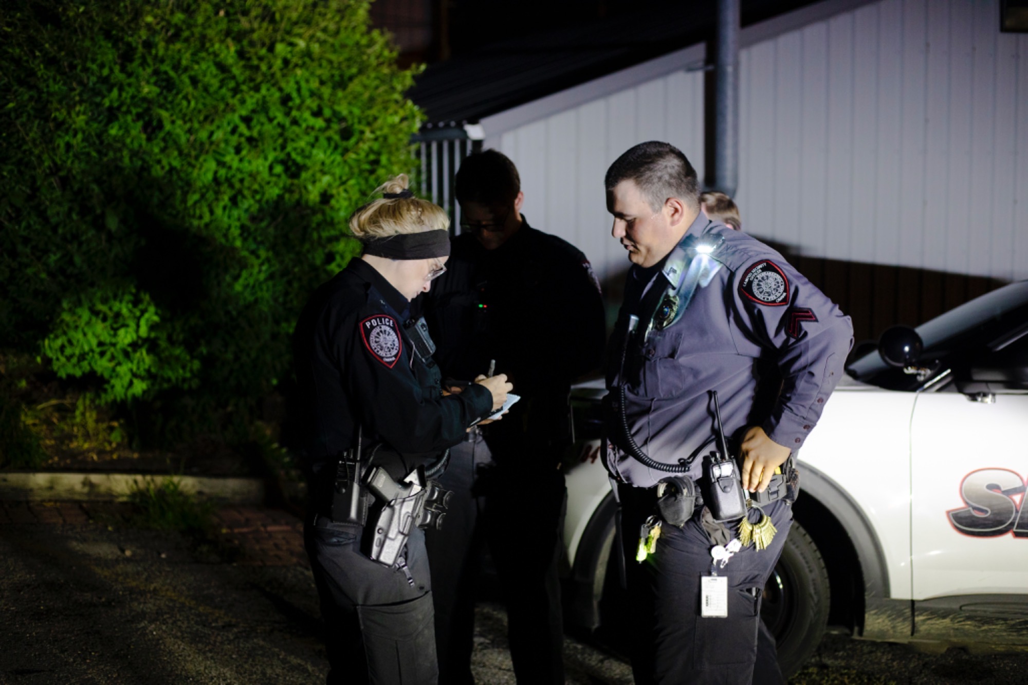 Campus officer speaking with a campus security officer on call