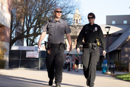 uno public safety officers walking on Dodge campus