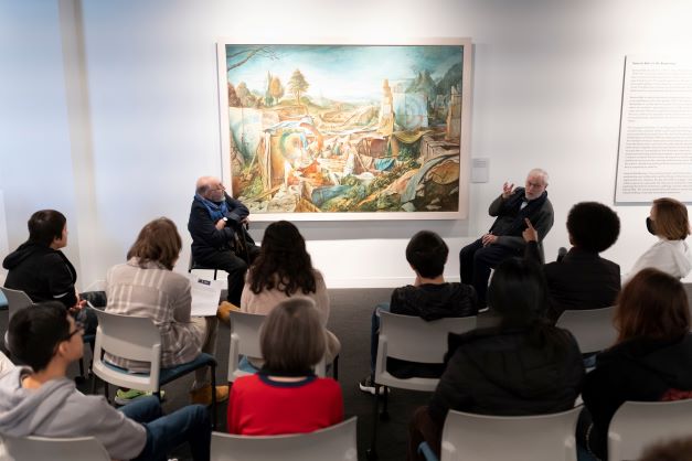 Samuel Bak and Bernie Pucker discuss the artwork with high school students