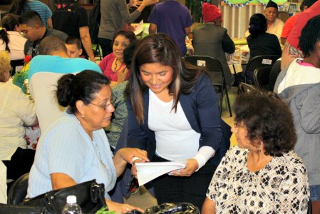 student working with older adult