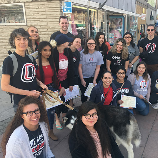 UNO faculty and service learning class photo. 