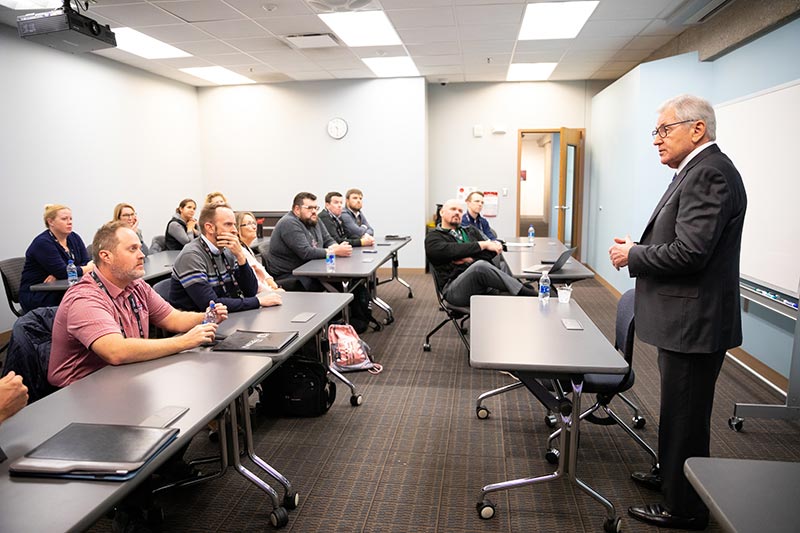 chuck hagel speaking to high school students.