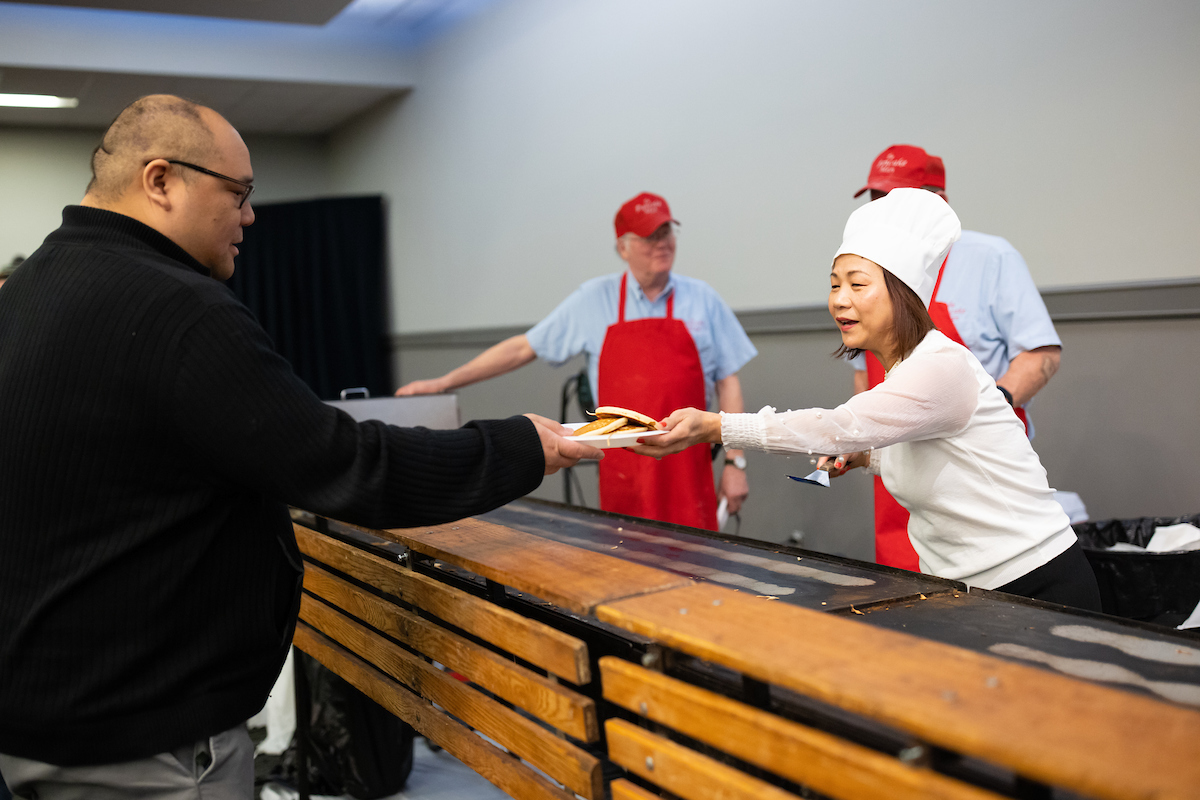 Chancellor Li participates in Maverick Pancake Palooza presented by the Staff Advisory Council on Tuesday, April 5, 2022, in Omaha, Nebraska.